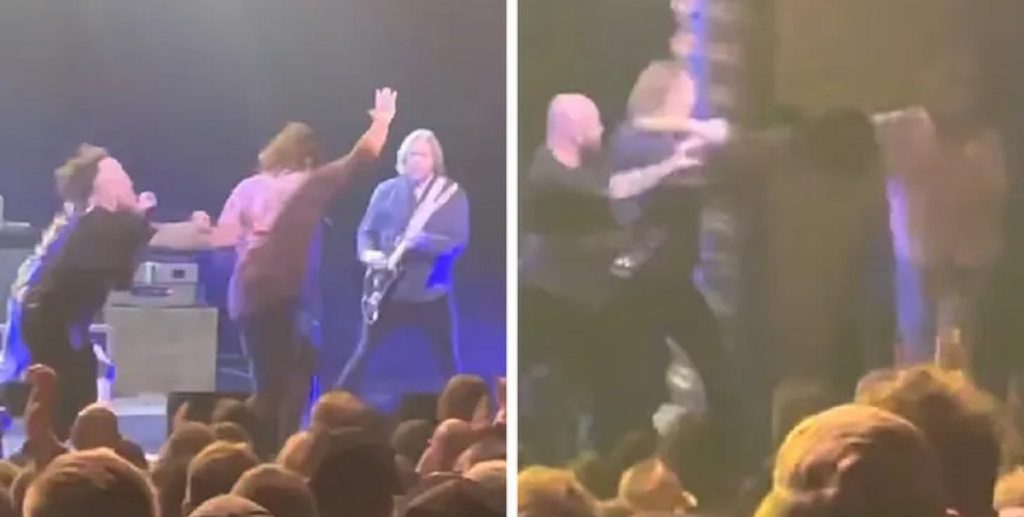 Chok under koncert: Fan tæsket med guitar