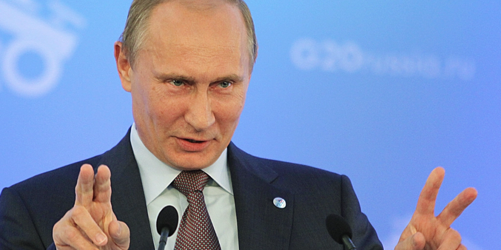 Da Putin havde fortalt sin joke, sad hele salen forbløffet tilbage