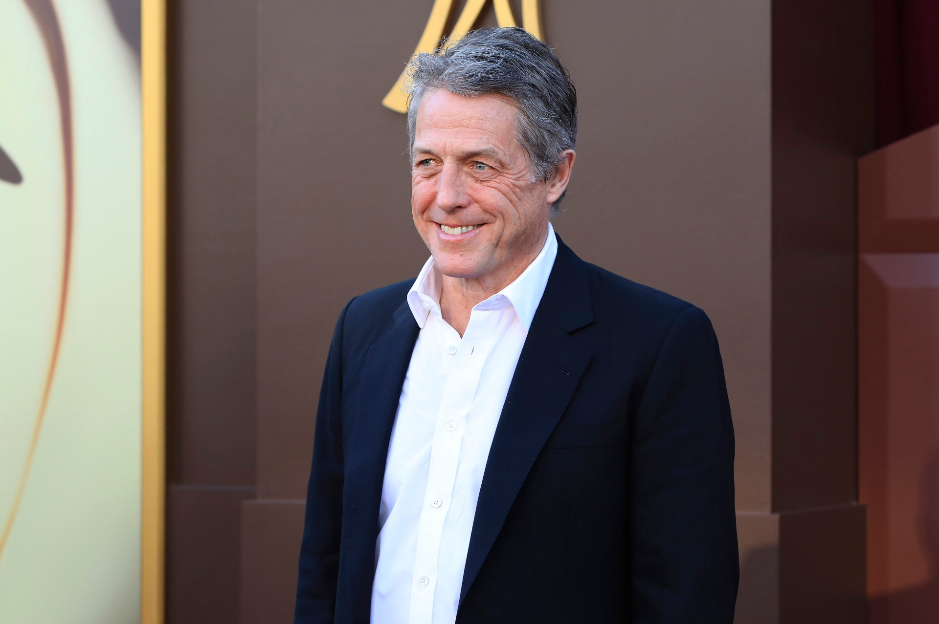 Hugh Grant sviner sin egen rolle