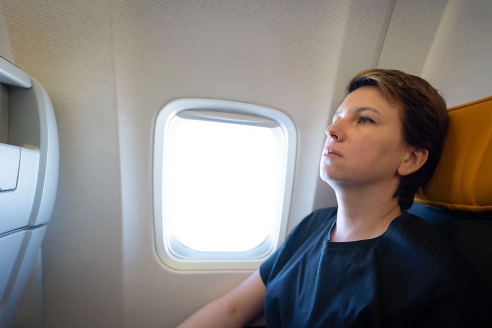 Derfor bør du ikke være iført en t-shirt, når du er ombord på et fly