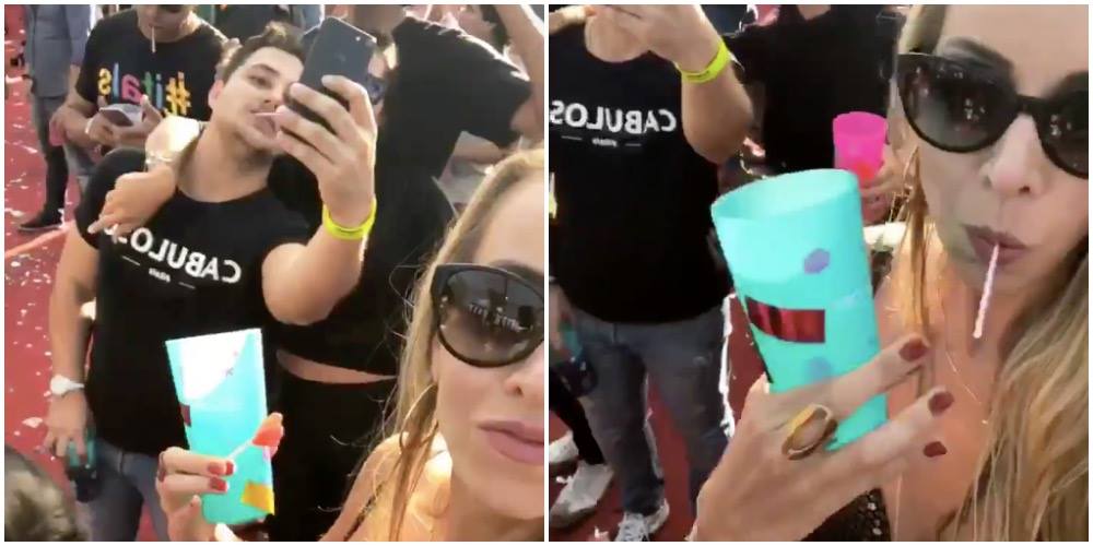 Ung kvinde filmer sig selv på festival – men se så hvad der sker til venstre i videoen